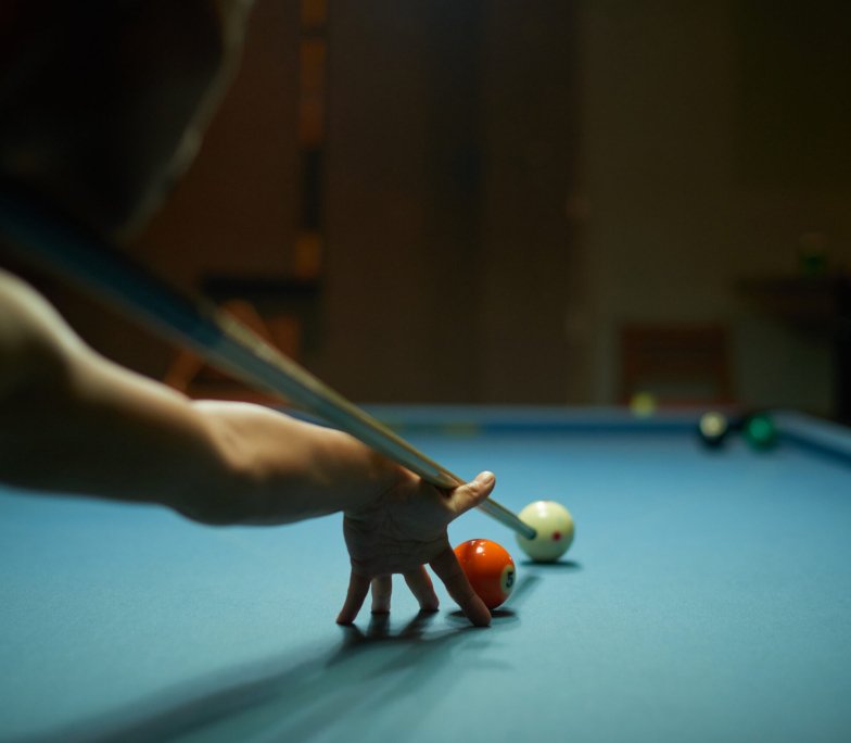Close-up image of player preparing to hit the ball